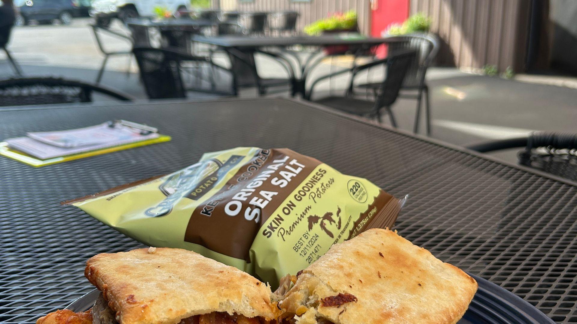 FWB's Cuban Sandwich on a table in our outdoor patio space